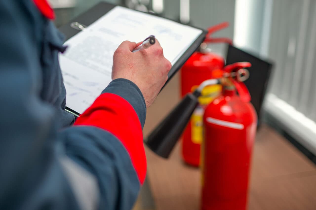 Engineer Professional are Checking A Fire Extinguisher Using Cli